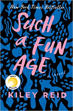 Cover of Such a Fun Age by Kiley Reid, which features the title in handwritten pink script on top of a blue and black patterned background.
